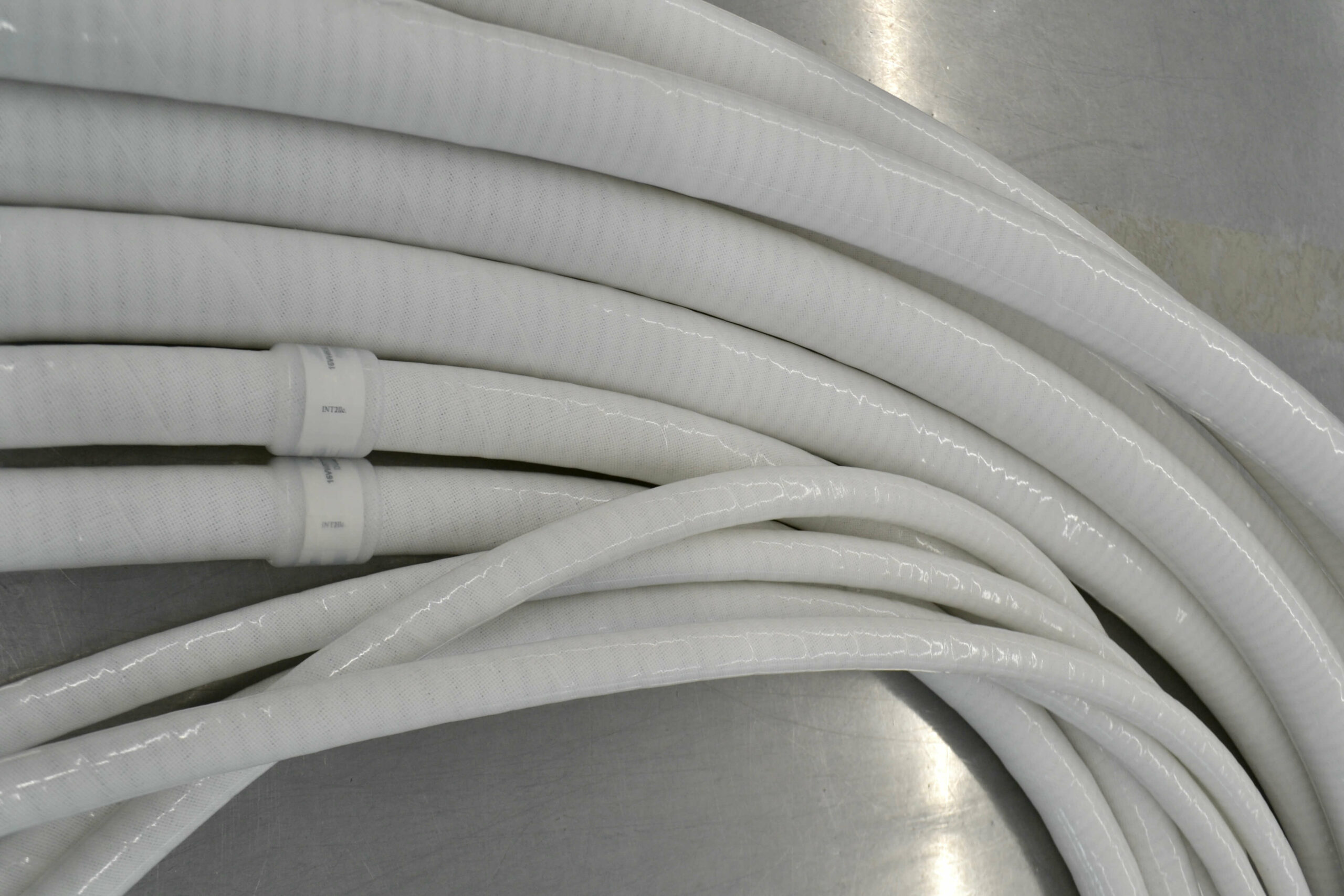 Coiled wire reinforced silicone hose